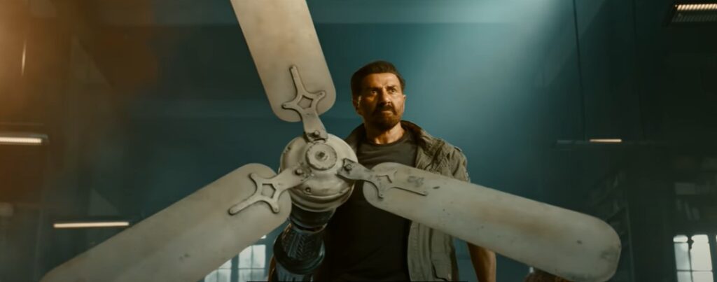 Sunny Deol action scene from Jaat film with explosion background