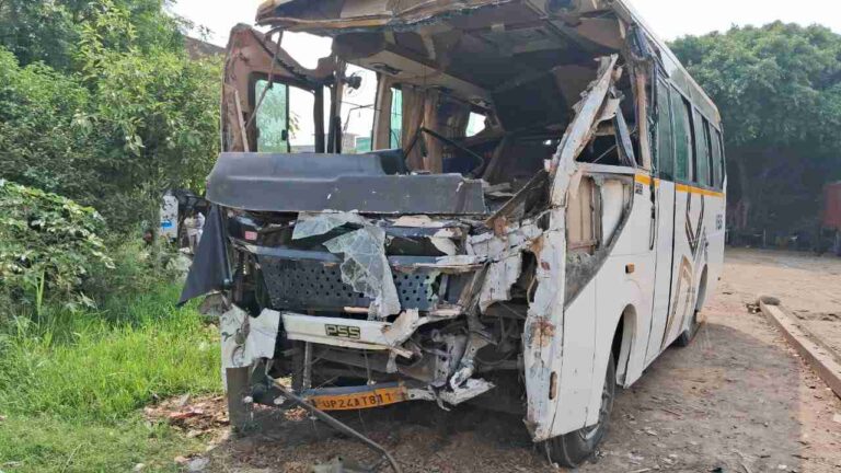 Bijnor bus accident with damaged shops and bus crash site