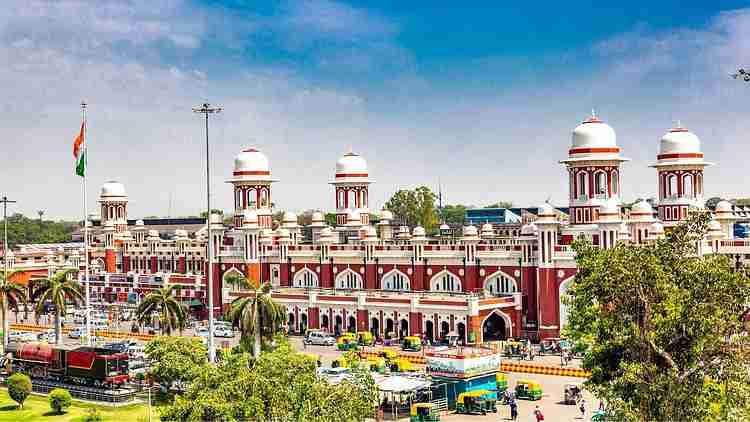 Charbagh Railway Station with machinery in the background.
